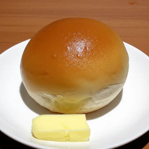 他喜欢一个热的小面包加黄油。