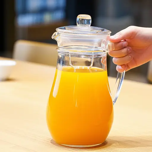 请把那壶果汁递给我。