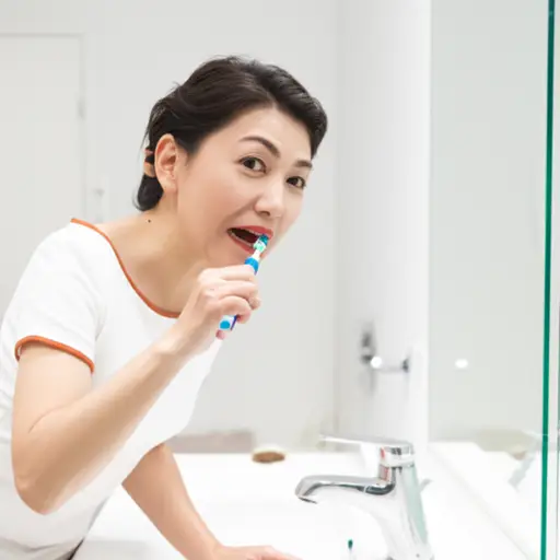 我妈妈用电动牙刷刷牙。