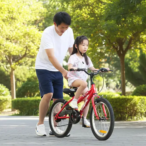 我妹妹正在学习骑自行车。